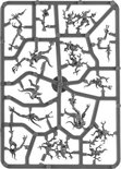 Platine grise moulée par injection avec de nombreuses petites figurines démoniaques de Tzeentch Blue Horrors.