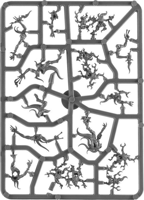 Platine grise moulée par injection avec de nombreuses petites figurines démoniaques de Tzeentch Blue Horrors.