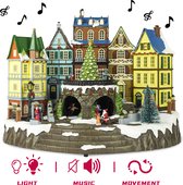 Village de Noël Kristmar avec sapin de Noël rotatif, maisons illuminées et patineurs joyeux - Maison de Noël avec éclairage, musique et mouvement - Maisons de Noël avec éclairage LED - L42xW26xH32 cm - 4,5V - Plastique - Multicolore