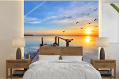 Behang - Fotobehang Water - Steiger - Vogels - Zonsondergang - Horizon - Breedte 240 cm x hoogte 240 cm