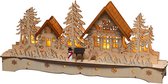 Maison de Noël Konstsmide à l'extérieur de la scène de la forêt avec des maisons en bois de bonhomme de neige et de renne