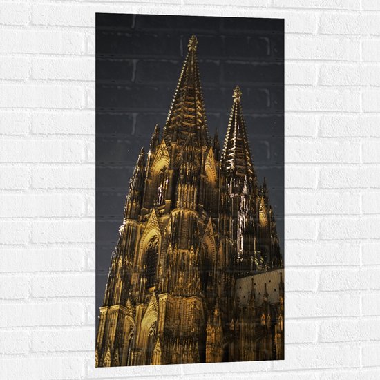 WallClassics - Muursticker - Dom van Keulen - Kerk in de Nacht - 50x100 cm Foto op Muursticker