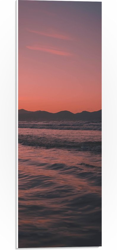 WallClassics - PVC Schuimplaat - Golvende Zee met Oranje Paarse Lucht - 20x60 cm Foto op PVC Schuimplaat (Met Ophangsysteem)