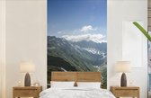 Behang - Fotobehang Sneeuw op de bergen van het Nationaal park Hohe Tauern in Oostenrijk - Breedte 120 cm x hoogte 240 cm