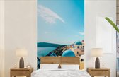 Behang - Fotobehang Middag in Santorini Griekenland - Breedte 120 cm x hoogte 240 cm
