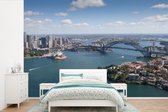 Behang - Fotobehang Luchtfoto van de enorme Australische stad Sydney - Breedte 360 cm x hoogte 240 cm