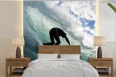 Behang - Fotobehang Surfer op golfen - Breedte 280 cm x hoogte 280 cm