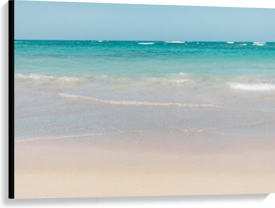 WallClassics - Canvas - Wit Strand met Helderblauwe Oceaan - 100x75 cm Foto op Canvas Schilderij (Wanddecoratie op Canvas)