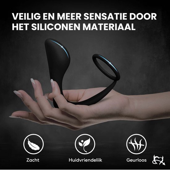 Hand met zachte, huidvriendelijke, geurloze zwarte prostaatstimulator met cockring.