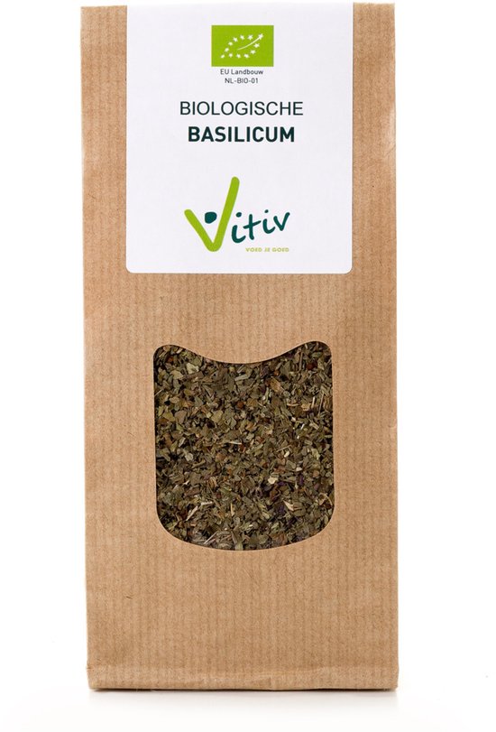 Bruine papieren zak met gedroogde basilicumblaadjes, met een venster. In het wit staat: 'EU Landbouw NL-BIO-01 BIOLOGISCHE BASILICUM Vitiv VOED JE GOED'.
