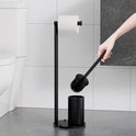 Zwarte toiletrolhouder met toiletborstel in een badkameromgeving.
