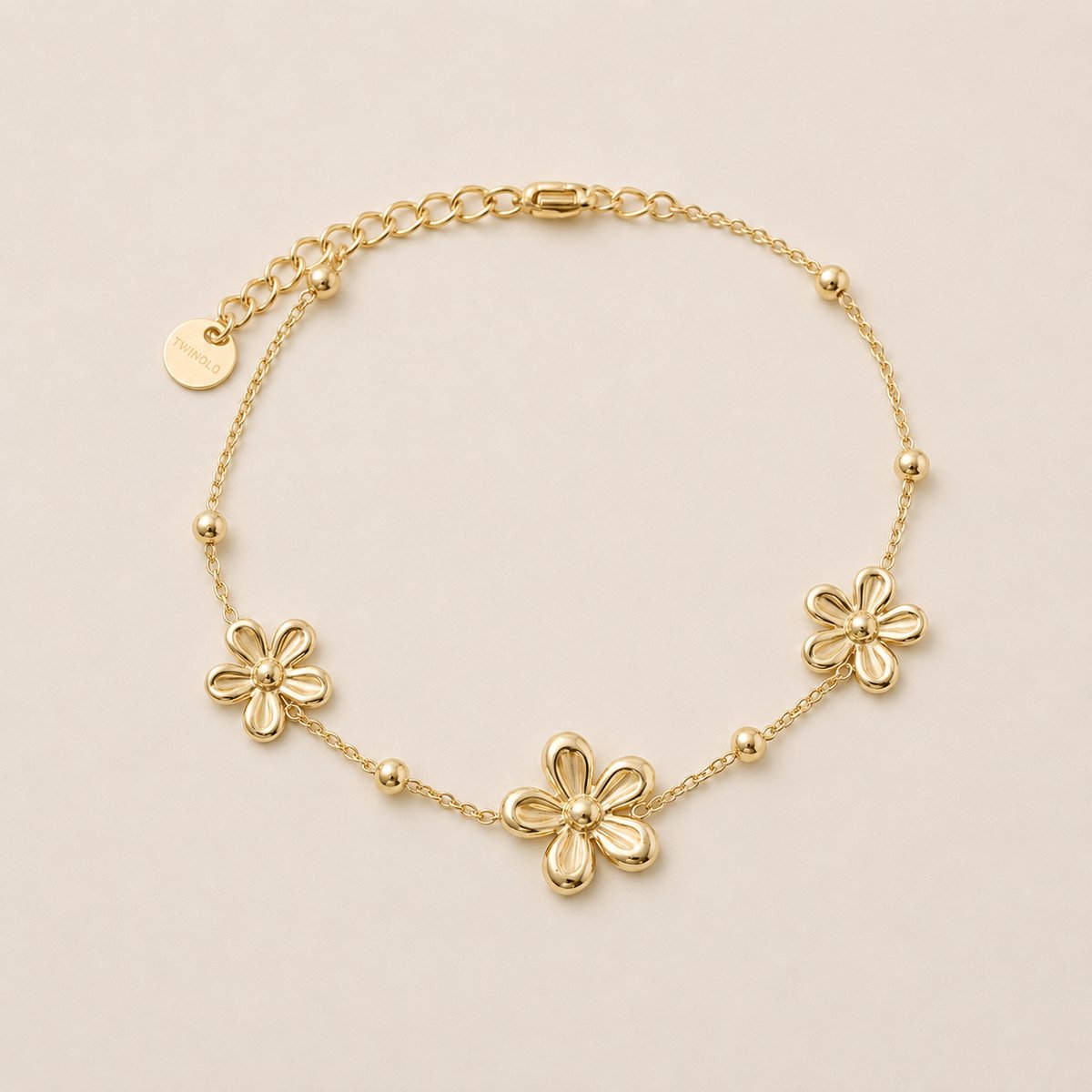 Bloemenarmband Goudkleurig met 3 Bloemen – RVS – 17 + 5 cm | TWINOLO