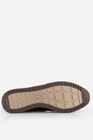 Onderkant van bruine suède Gabor sneakers met beige zool en Gabor-logo.