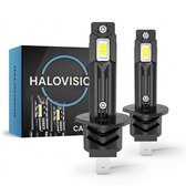 Twee zwarte HaloVision LED-koplampen naast hun verpakking met blauwe details.
