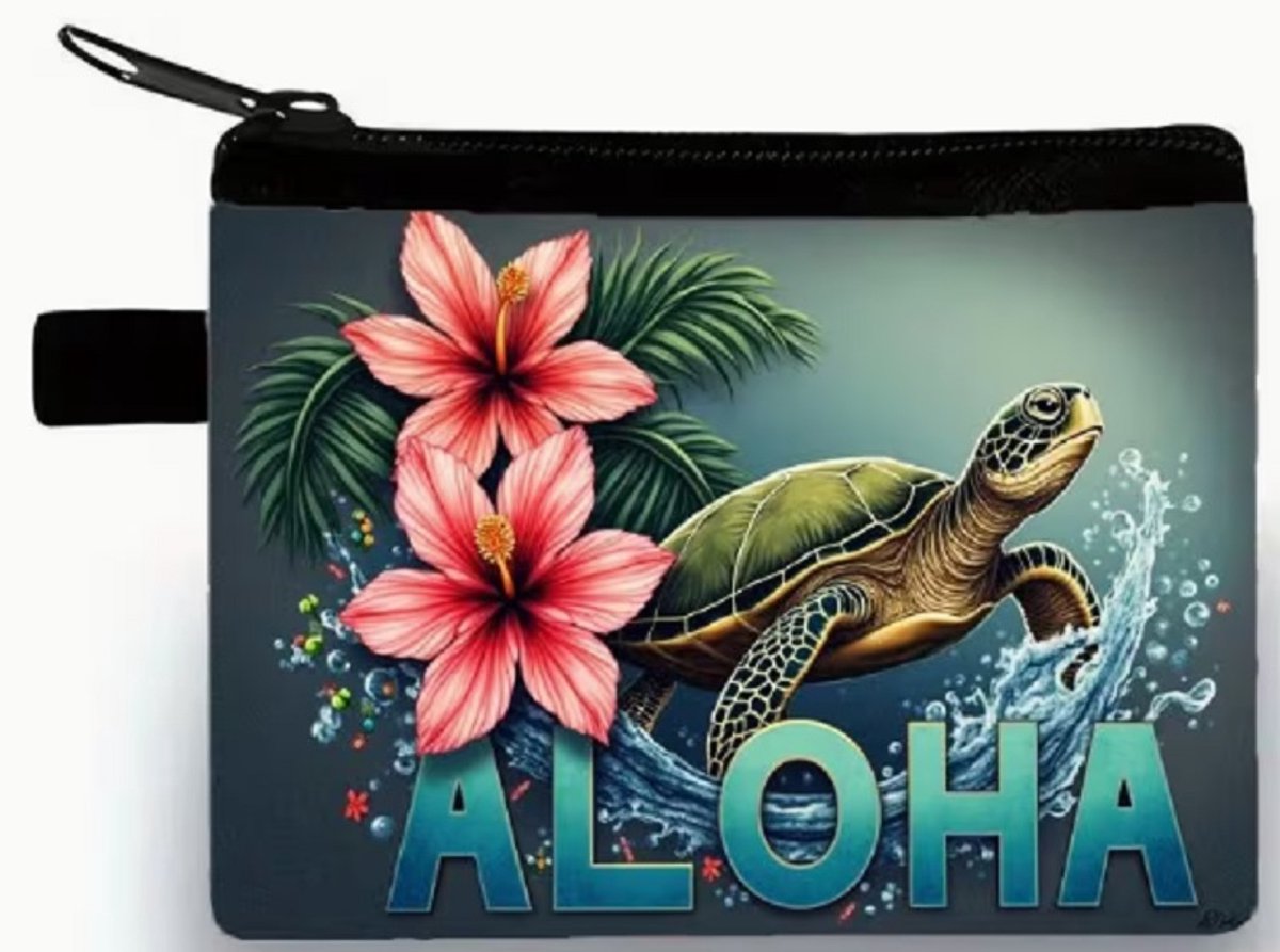 Gemakkelijk om erbij te hebben, dit handige rits portemonneetje 10x14cm. Een mooie afbeelding van een zeeschildpad onder water. Erg leuk om voor jezelf te kopen of om cadeau te geven. Ook leuk bij Sinterklaas, Kerst of vakantie.
