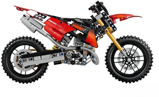 Lego Technic Ducati motorfiets, rood met zwarte en gouden details, mechanische onderdelen zichtbaar. Nummer 222.