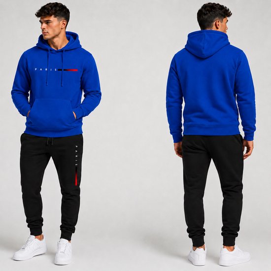 Man in koningsblauwe hoodie met 'PARIS' opdruk en zwarte trainingsbroek met rode en zwarte strepen.