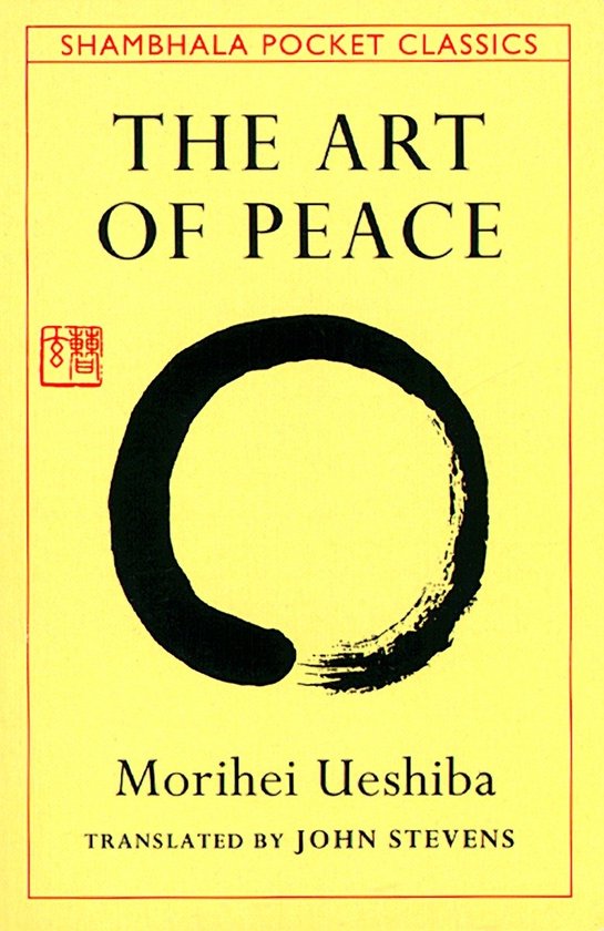 Boek "The Art of Peace" van Morihei Ueshiba met een zwarte ensō-cirkel op een gele achtergrond.