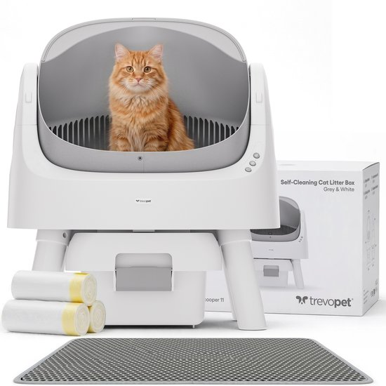 Litière autonettoyante 'TrevoPet' grise et blanche, avec un chat roux à l'intérieur. Tapis et sacs poubelles inclus.