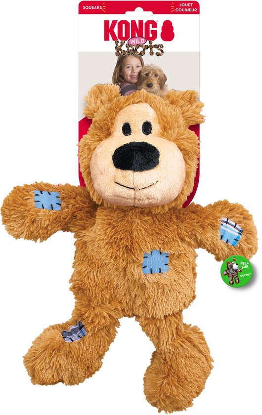 Bruine teddybeer met blauwe patches en een "Feel Me"-knop. Verpakking met een kind en hond.