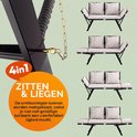 Zwarte polyrottan 4-in-1 tuinbank met crèmekleurige kussens, verstelbaar tot ligbed.