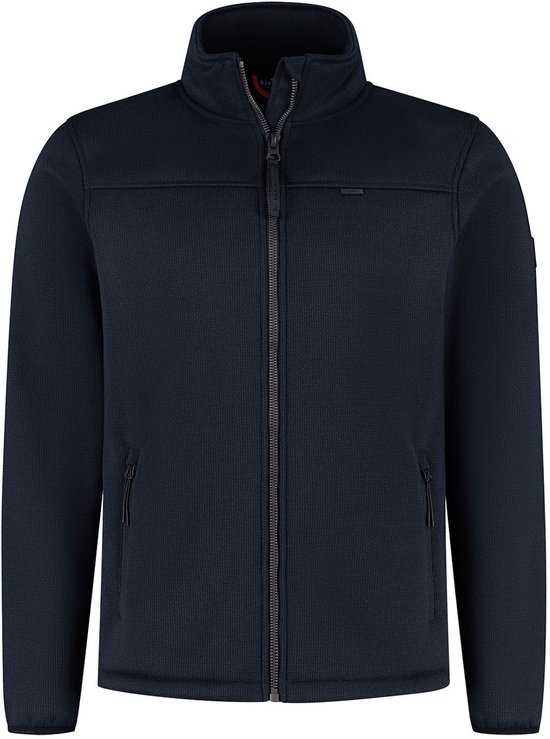 Donkerblauw Kjelvik outdoorvest met rits en hoge kraag. Zichtbaar Kjelvik logo op de mouw.