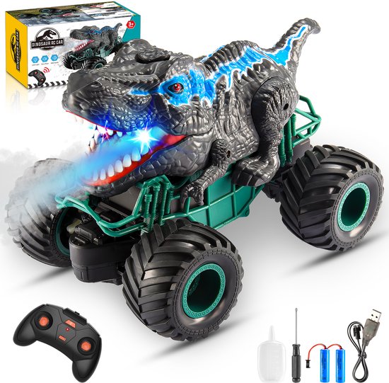 Dinosaurus RC monster truck met grote wielen, LED-ogen en blauwe vlammen uit de bek. Inclusief afstandsbediening en accessoires.
