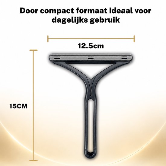 Brosse anti-peluches noire avec manche en Y. Dimensions 15 cm de haut et 12,5 cm de large.
