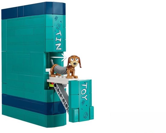 Blauwgroene LEGO boekensteun met Slinky Hond op een richel, die uit de zijkant steekt.