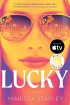 Couverture du livre 'Lucky' avec un gros plan sur une femme portant des lunettes de soleil, reflétant Las Vegas. 'LUCKY' et 'MARISSA STAPLEY' sont en évidence sur la couverture.