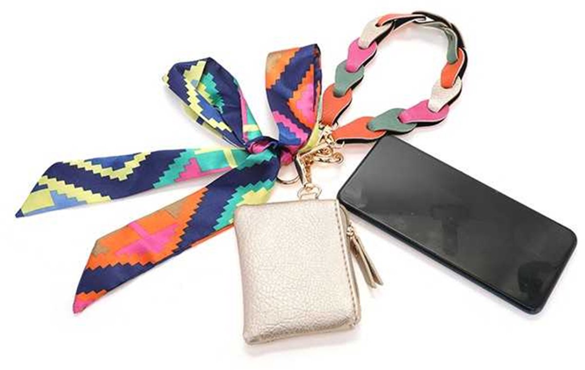 Telefoonkoord vegan leer - telefoon accessoire polsbandje met portemonnee en strik - multicolor - I'm Dutch