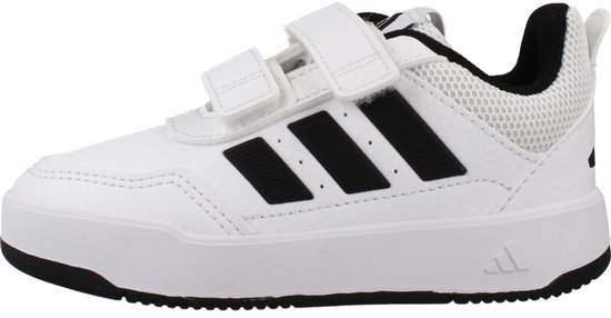 Witte kindersneaker met klittenbandsluiting, zwarte Adidas-strepen op de zijkant en witte Adidas-logo op de tong.