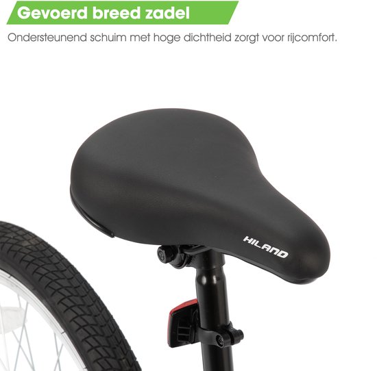 Zwart, gevoerd zadel op een groene kinder BMX fiets.