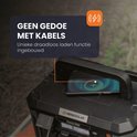 Zwarte powerstation met telefoon die draadloos oplaadt. "GEEN GEDOE MET KABELS"