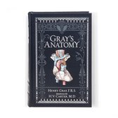 Couverture grise de 'Gray's Anatomy' avec une illustration anatomique d'un cœur et des bordures décoratives.