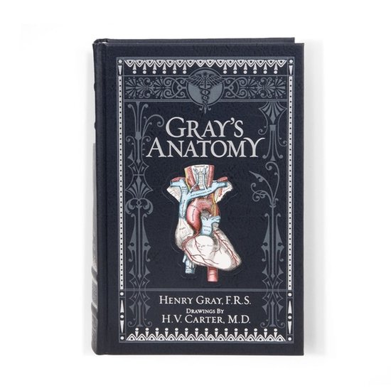 Grijze kaft van 'Gray's Anatomy' met een anatomische illustratie van een hart en versierde randen.