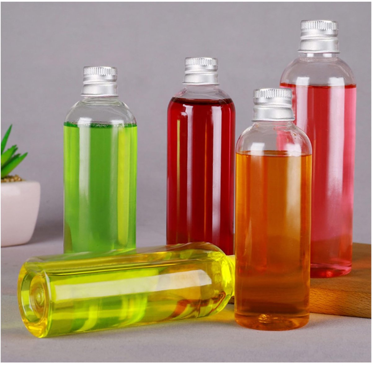 10Pack 80ml Plastic Flessen, Mini Alcoholflessen met Zilveren Schroefdoppen, Herbruikbare Saus Fles met Funne (80ML)