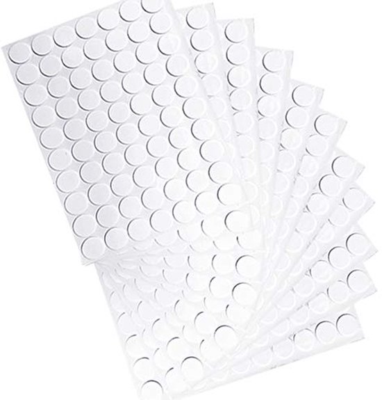 Pile de feuilles avec de petites pastilles adhésives rondes double face.