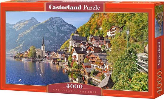 Castorland puzzeldoos met afbeelding van Hallstatt, Oostenrijk, aan een meer.