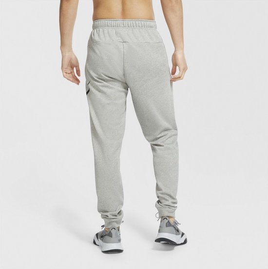 Nike - Dri- FIT Tapered Training Pants - Grijs - Homme - taille M | bol.com
