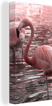 Canvas Schilderij Een groep flamingo's staat in het water - 40x80 cm - Wanddecoratie