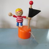 Drukpoppetje piraat met zwarte vlag