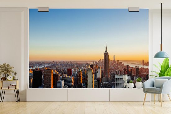 Papier peint Papier peint photo en vinyle - Skyline de New York avec un coucher de soleil largeur 390 cm x hauteur 260 cm - Tirage photo sur papier peint (disponible en 7 tailles)