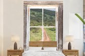 Behang - Fotobehang Doorkijk - Hout - Afrika - Breedte 170 cm x hoogte 260 cm
