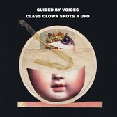Albumhoes met collage van een oog, mond en bloemen. Tekst: GUIDED BY VOICES CLASS CLOWN SPOTS A UFO.