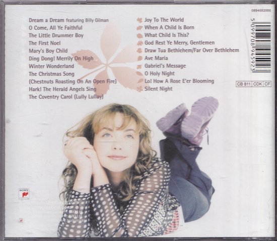 Een vrouw met krullend bruin haar ligt op haar rug, met haar benen omhoog. De achterkant van een cd-hoesje met de tracklist.