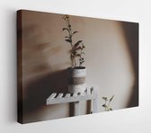 Canvas schilderij - Yellow petaled flower placed on pot -     1925526 - 115*75 Horizontal