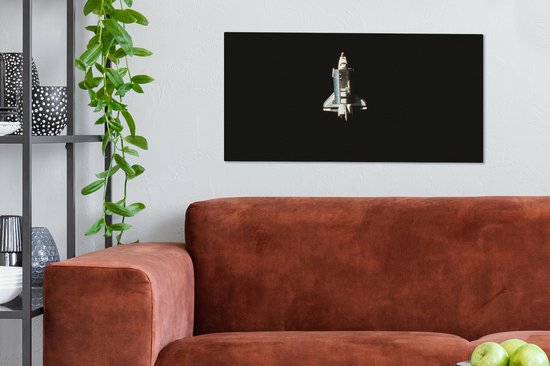 Tableau sur toile Une vue satellite d'une navette spatiale - 80x40 cm - Décoration murale