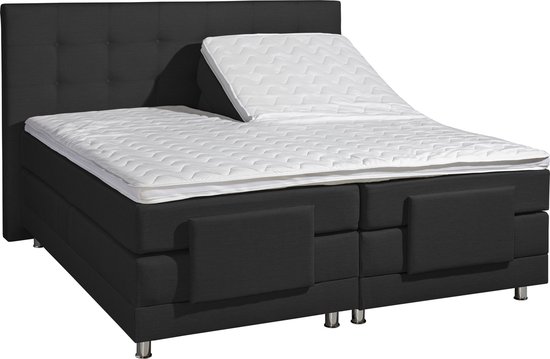 Zwart boxspringbed, dubbele uitvoering, met verstelbaar hoofdeinde en wit, ruitvormig matras.