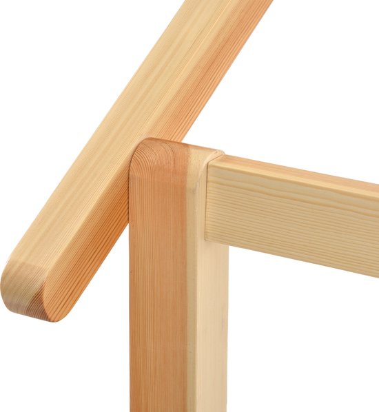 Detail van een houten bedframe met afgeronde hoeken en een schuine verbinding van een staander.